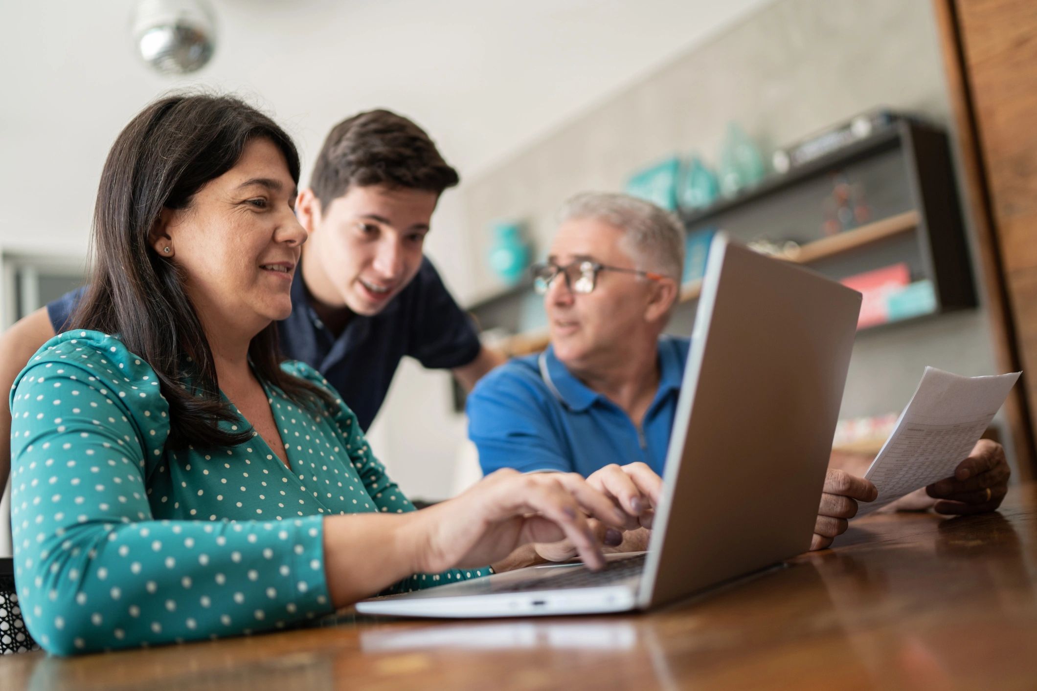 Parents discussing household finances and insurance planning