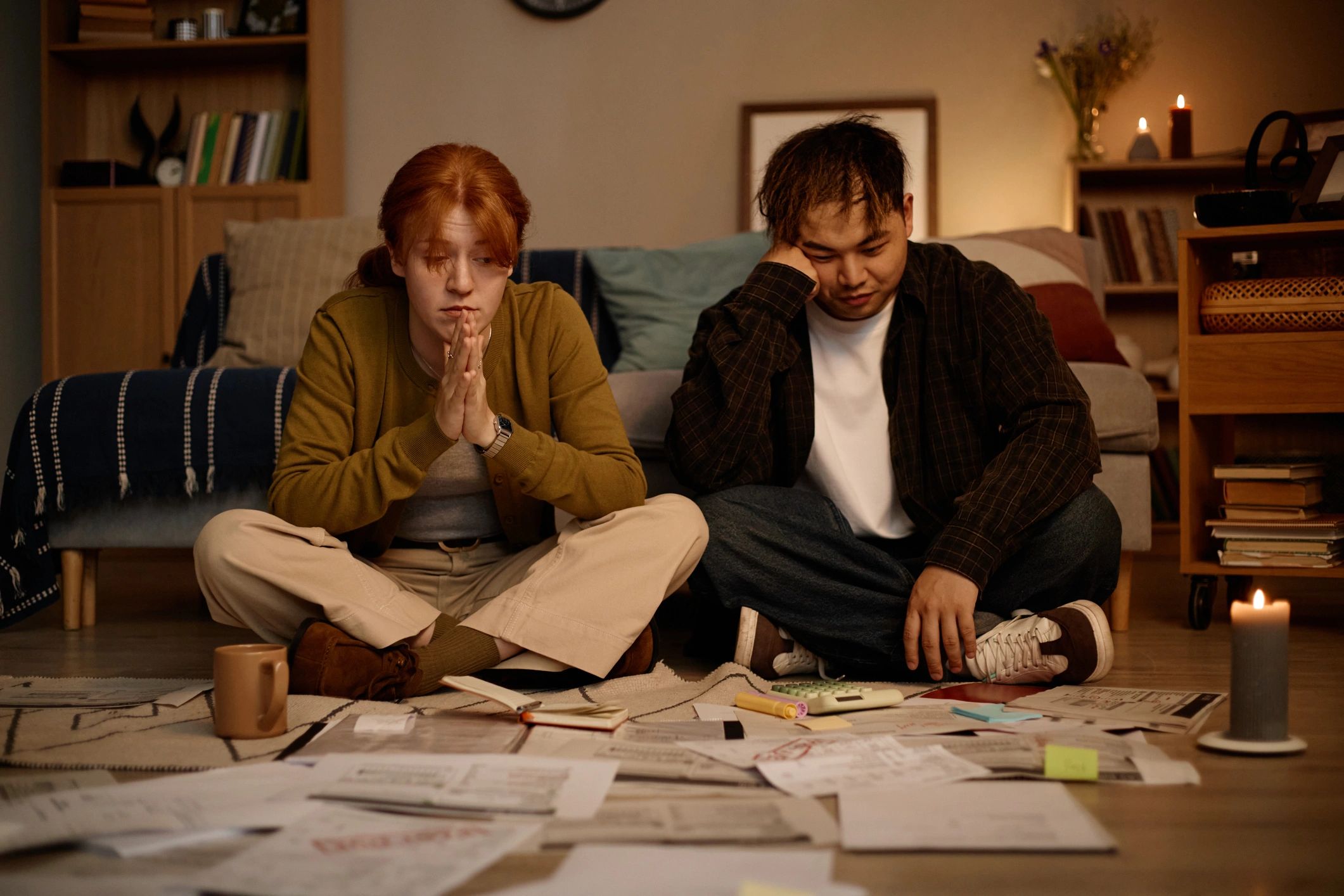 Couple reviewing bills and financial paperwork